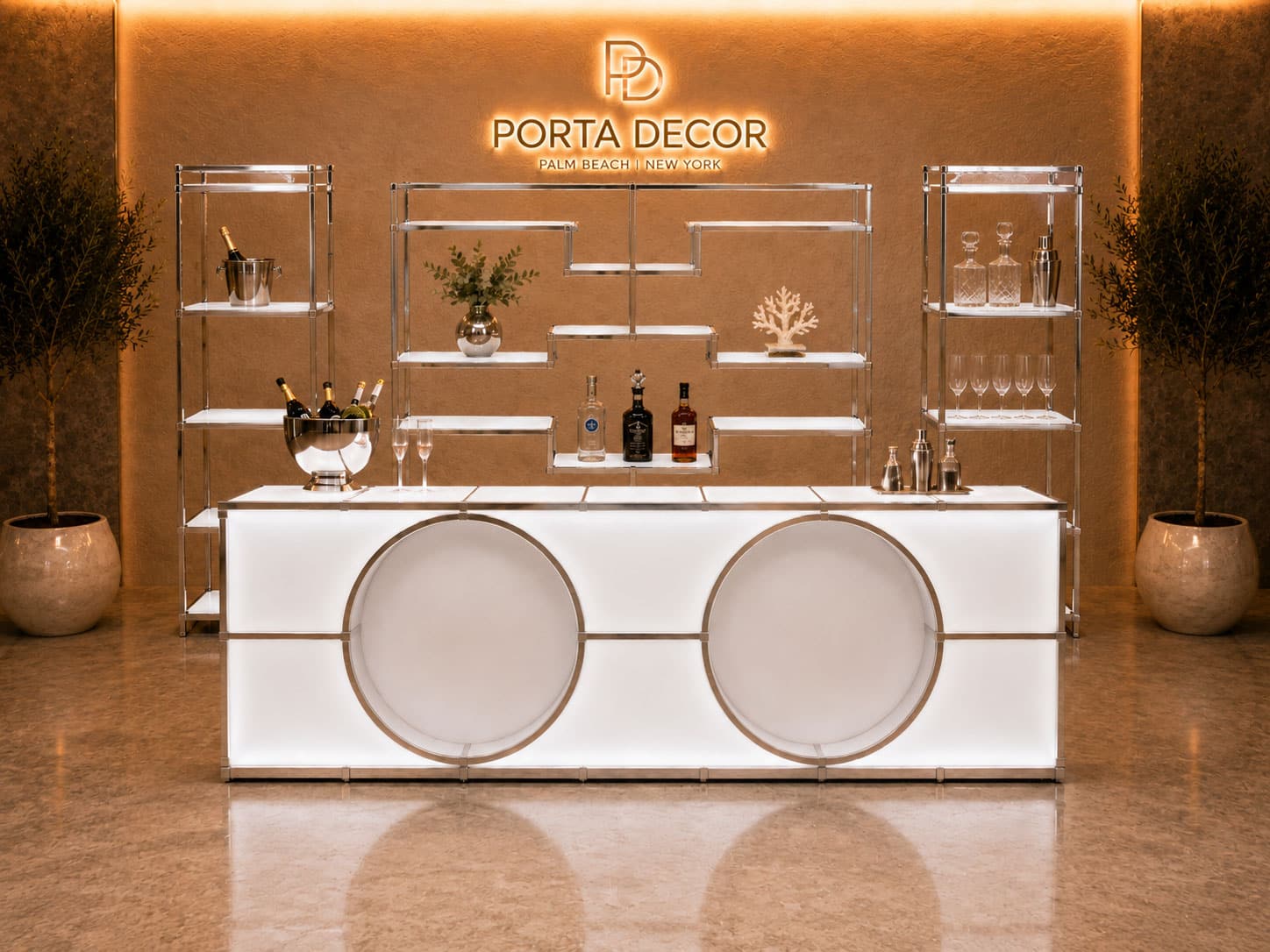 Custom event furniture fabrication featuring branded lounge seating, illuminated counters, and experiential activation furniture designed for trade shows and brand events.