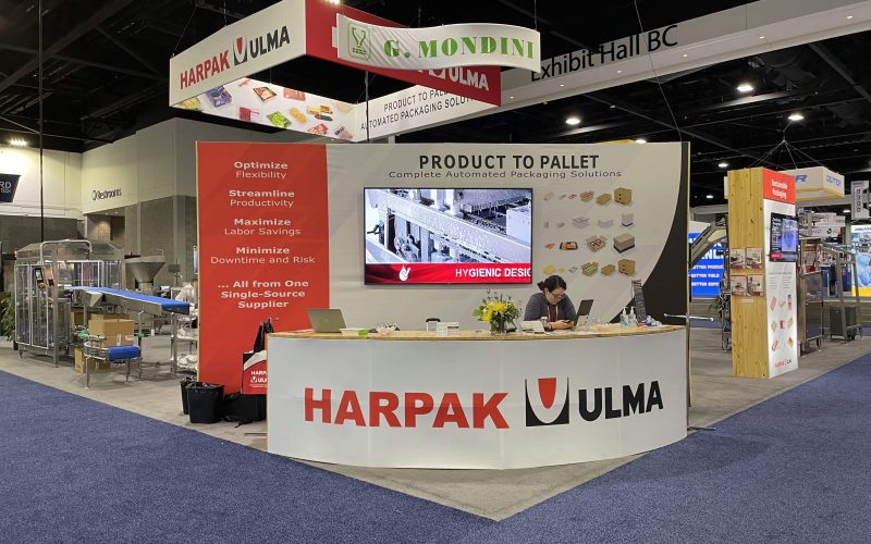 Custom trade show counters featuring branded fabrication, integrated storage, product displays, and attendee engagement areas designed for modern exhibit booths.