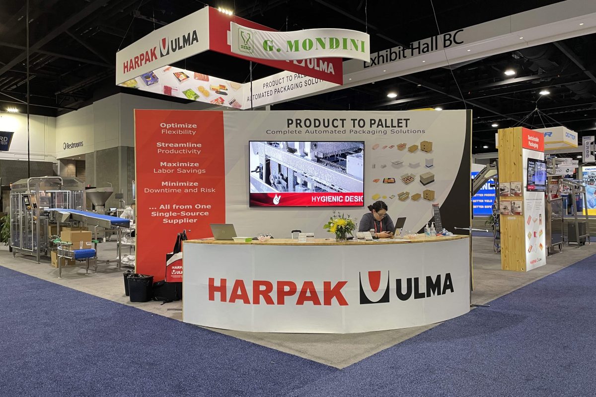 Custom trade show counters featuring branded fabrication, integrated storage, product displays, and attendee engagement areas designed for modern exhibit booths.